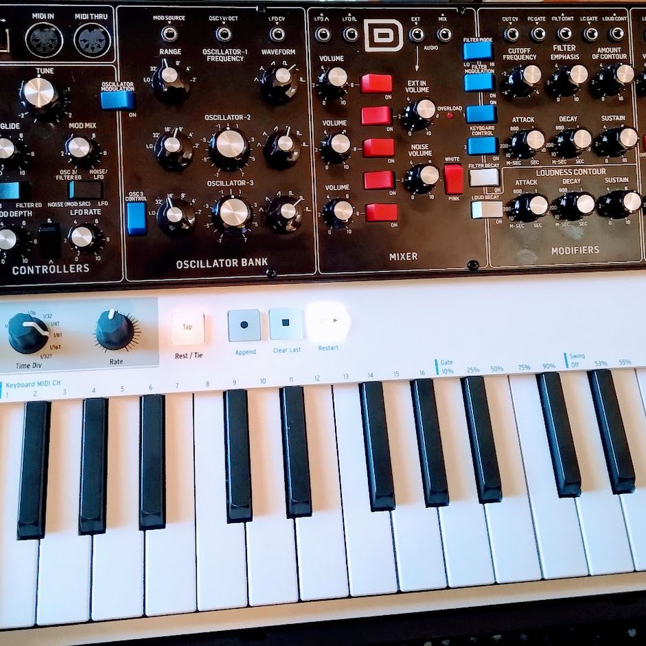 A Behringer Model D analog synth and an Arturia KeyStep sequencer keyboard